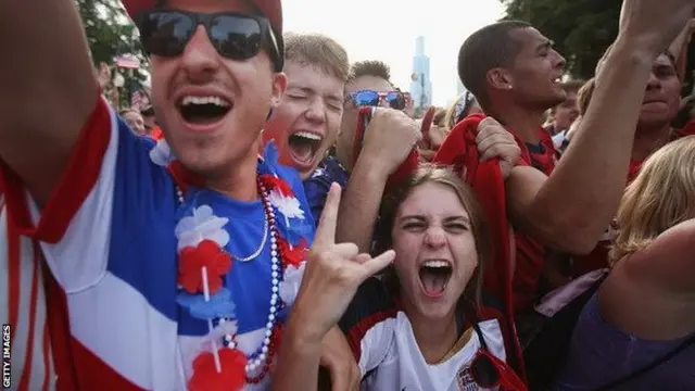 USA fans watch their team during the 2-2 draw with Portugal