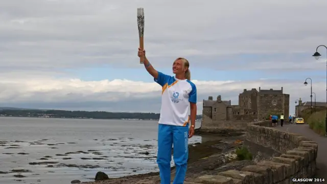 Jayne Clason with the baton at Blackness Castle