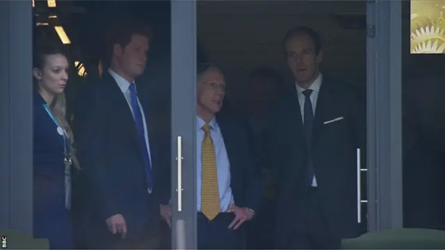 Prince Harry watches on as the England anthem is sung