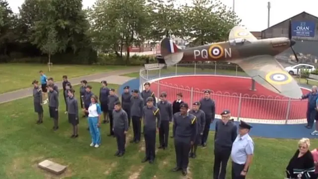 Sue Walker in front of the Spitfire memorial