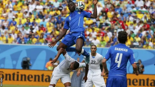 Mario Balotelli goes up for a challenge