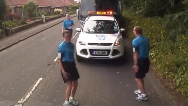 Baton relay escort officers dancing