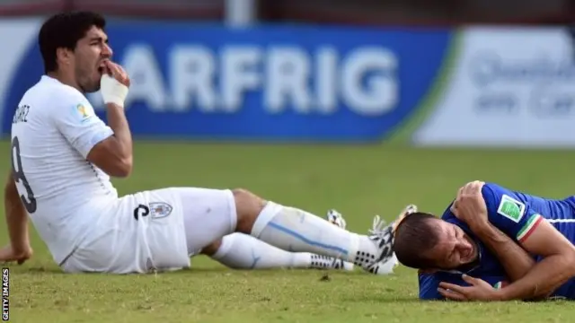 Luis Suarez and Giorgio Chiellini