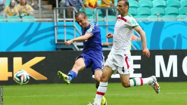 Avdija Vrsajevic of Bosnia and Herzegovina shoots and scores