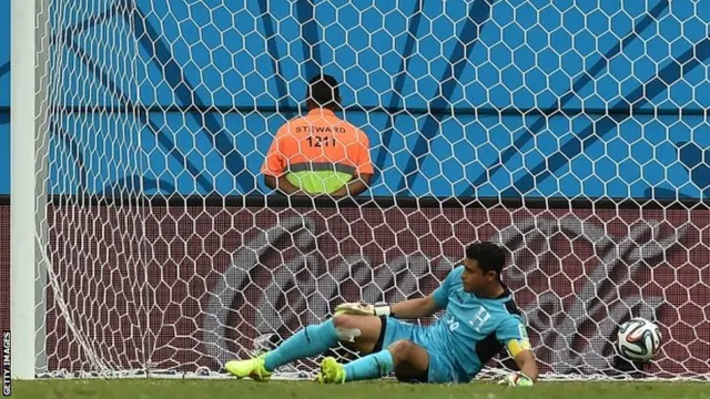 Switzerland's forward Admir Mehmedi fails to stop a goal