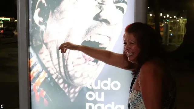 Woman in Rio with Luis Suarez poster