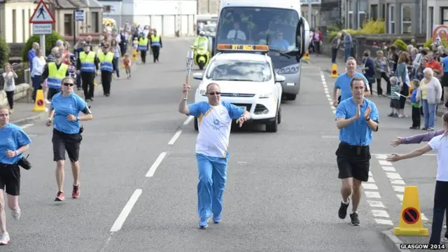 Steven Paulding carries the Queen's baton in Leven.