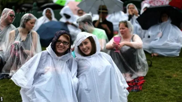 Fans in the rain