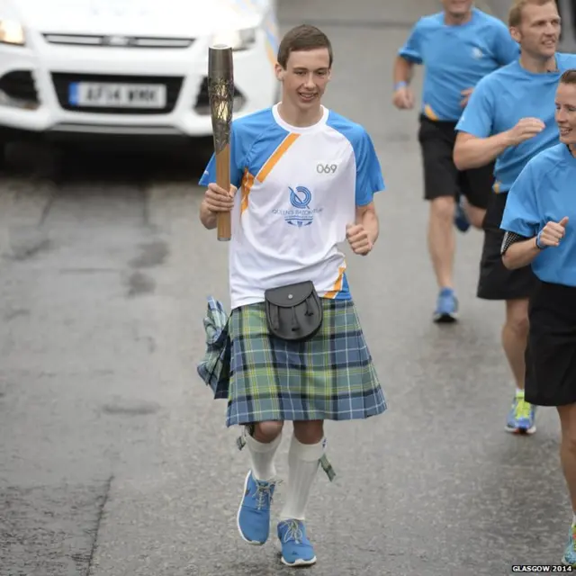 Robin Baillie carries the baton in Kirriemuir