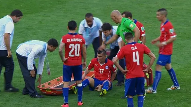 Gary Medel and stretcher