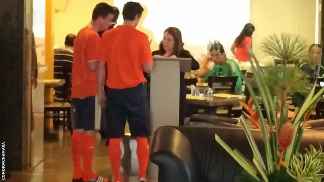 Netherlands fans in full kit at breakfast