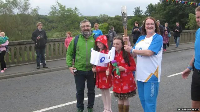 Elizabeth Watt with her family during the relay