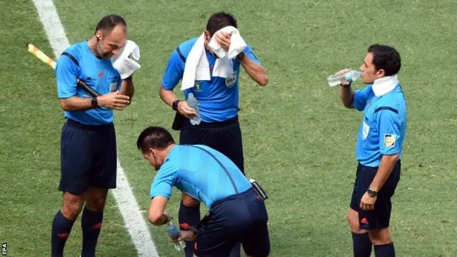 Officials in drinks break