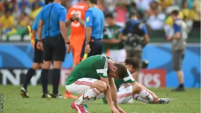 Dejected Mexican players