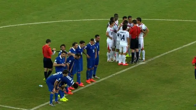 Players wait for penalties