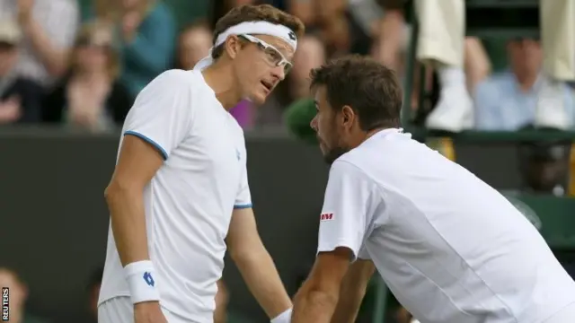 Denis Istomin and Stanislas Wawrinka