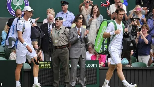 Andy Murray walks on to Centre Court