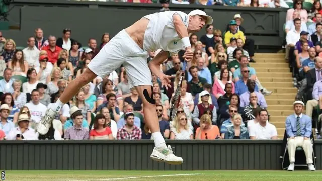 Kevin Anderson serves