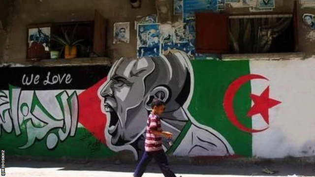 A mural depicts Algeria midfielder Sofiane Feghouli