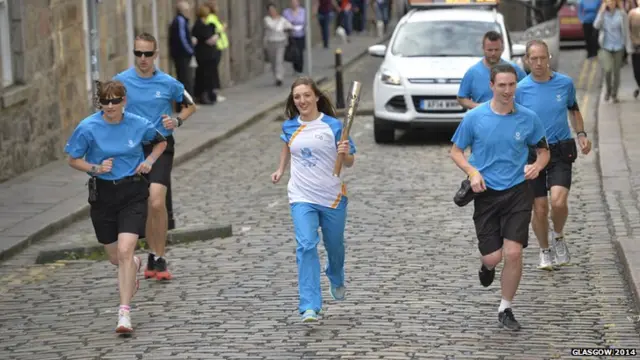 Becky Wain with the baton in Aberdeen