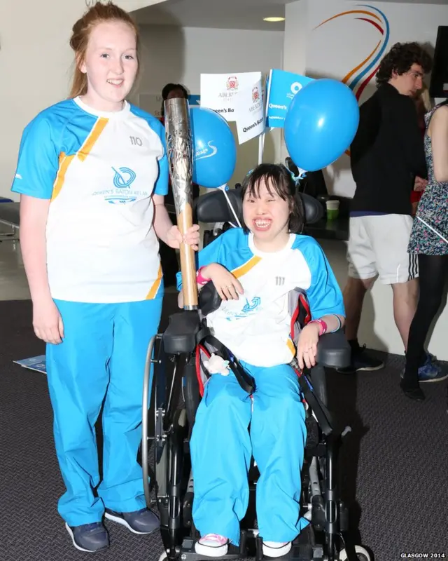 Erynn Fraser and Samantha Ho with the baton