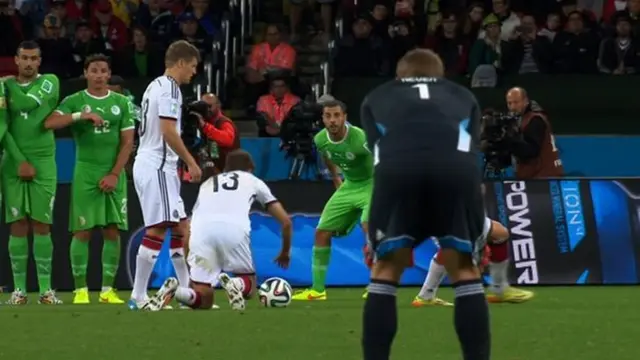 Thomas Muller on ground in elaborate free-kick routine