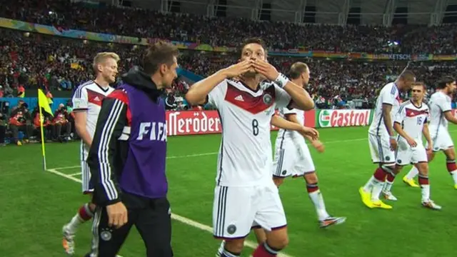 Mesut Ozil celebrates