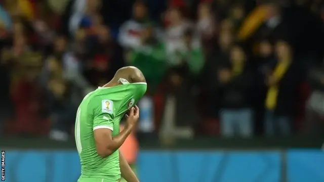 Sofiane Feghouli covers his face in his jersey