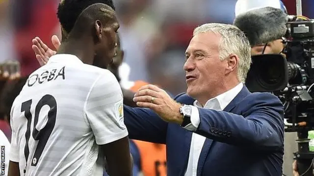 Paul Pogba (left) with Didier Deschamps