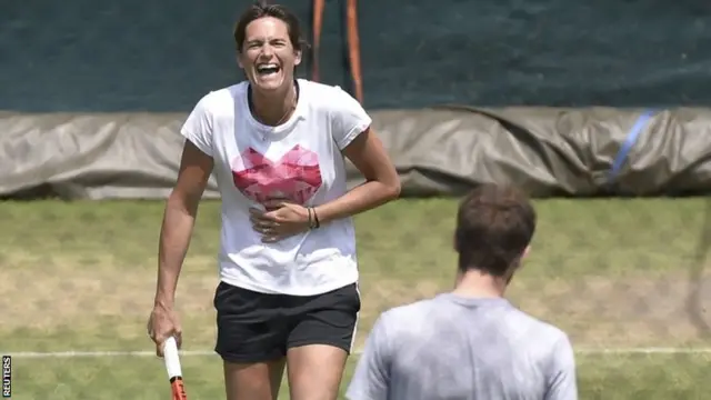 Amelie Mauresmo in practice with Andy Murray