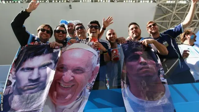 Poster of Messi, Pope Francis and Maradona