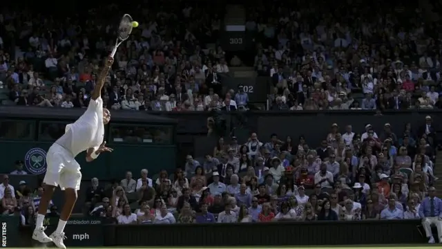 Nick Kyrgios serves