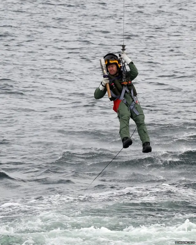 Baton being winched to a lifeboat