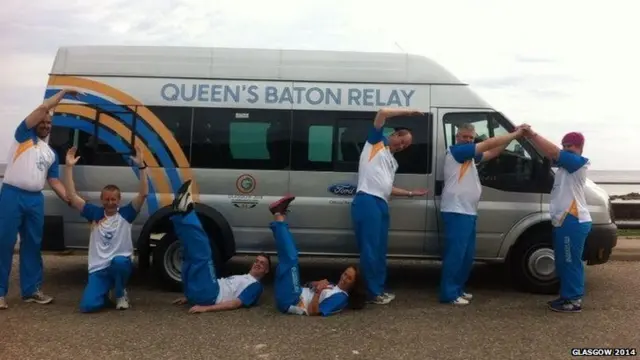 Baton bearers spell out the word "Cullen" with their bodies