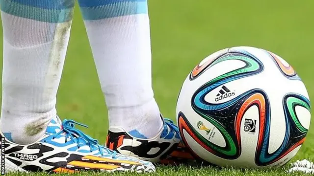 Lionel Messi and the Brazuca ball