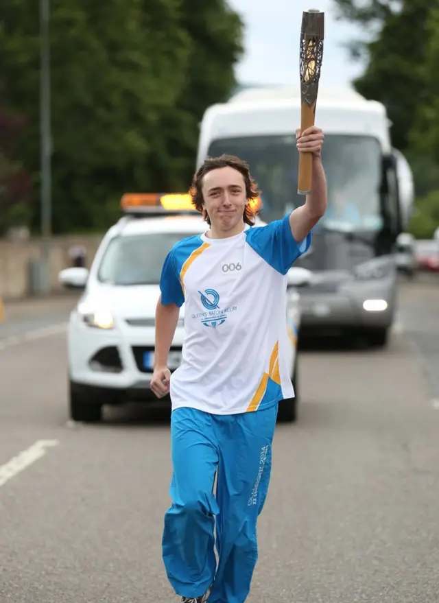 Michael Laing carries baton