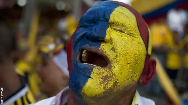 A Colombian fan cries