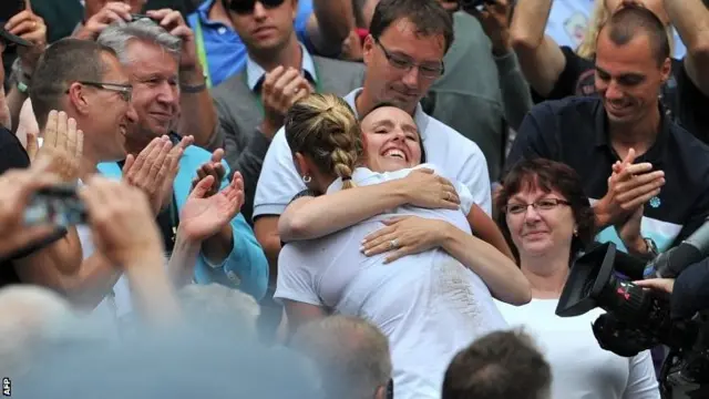 Petra Kvitova hugs Martina Hingis