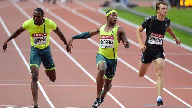 US sprinter Michael Rodgers (c) wins the 100m event, alongside second-placed Trinidad's Richard Thompson (l) and France's Christophe Lemaitre (r)