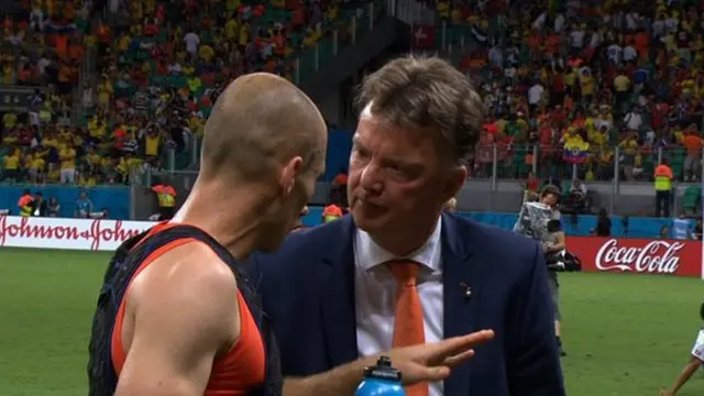 Arjen Robben, in vest, chats to Louis van Gaal