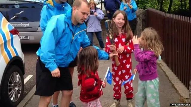 Tayside Police with kids and baton