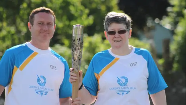 Kenneth Pearson and Katrina Petrie with baton in Thornhill