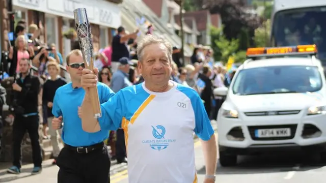 Alisdair Mair with baton in Aberfoyle