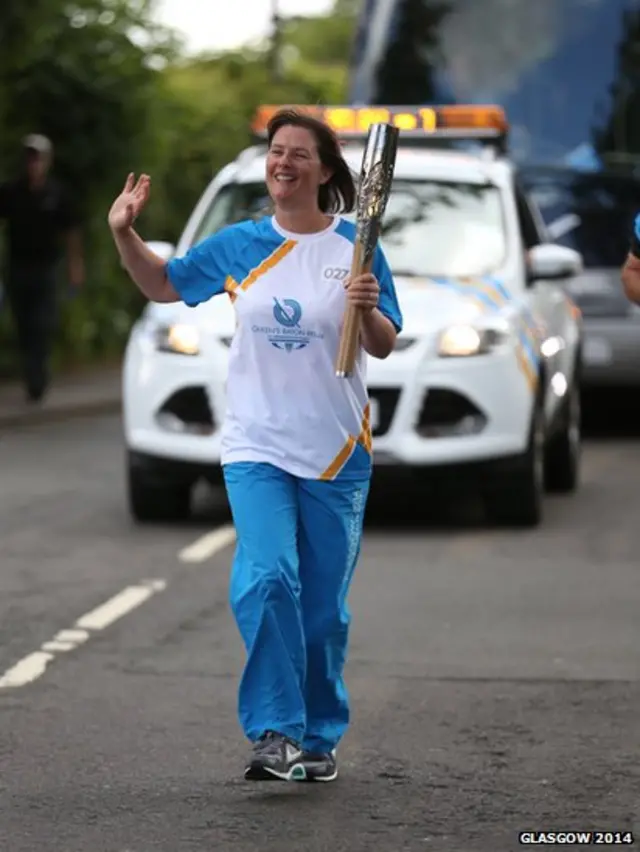 Traci Leven with the Queen's Baton in Drymen