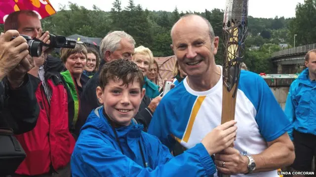 Sean Marshall and Fred MacAulay with the Queen's Baton