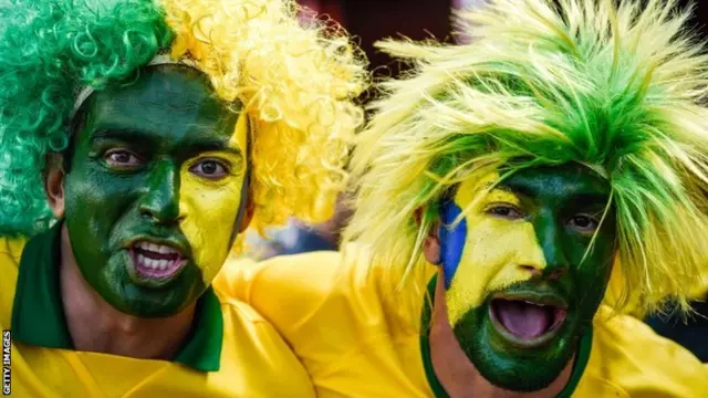 Fans of Brazil cheer outside Mineirao stadium