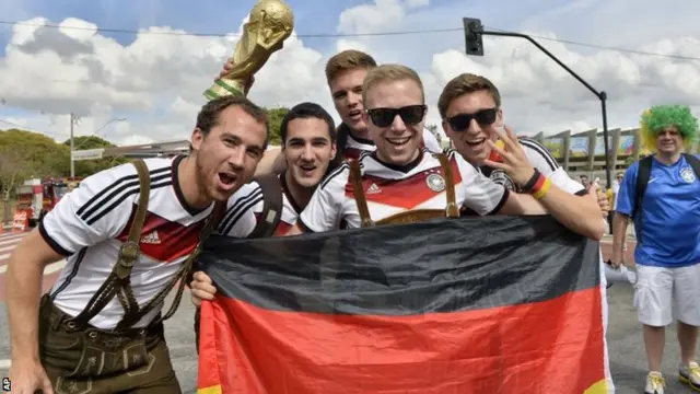 German fans show a flag