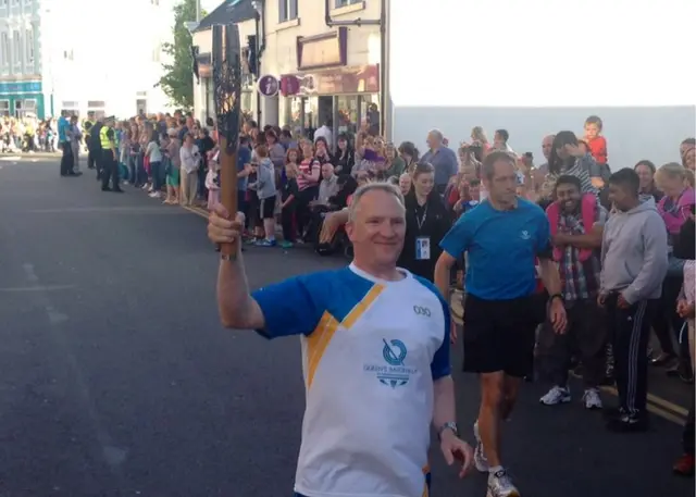 Baton bearer Donald MacLeod