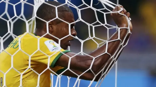 Brazil's Fernandinho reacts in his goal's net after they conceded a goal to Germany