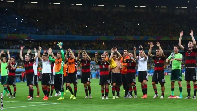 Germany acknowledge the fans at full time